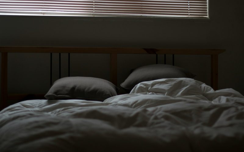 empty white and gray bed set