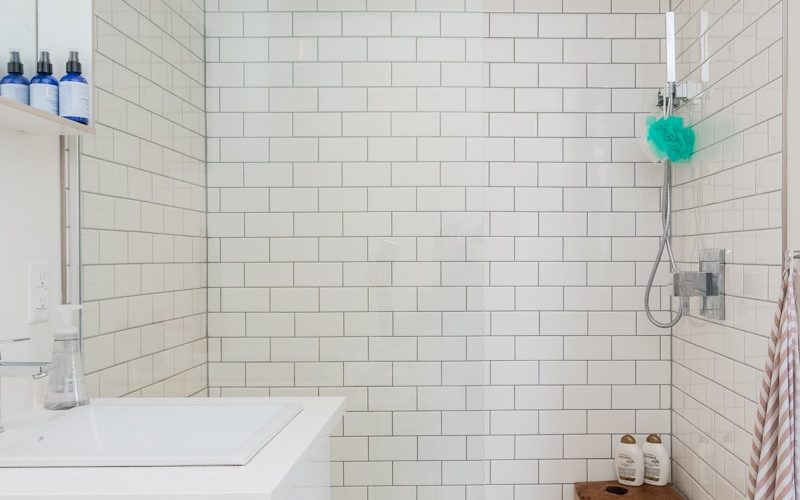 white ceramic sink near white ceramic sink