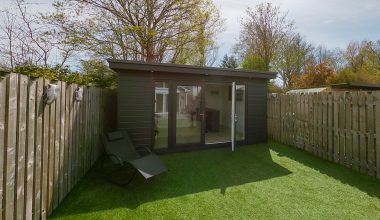 a small shed in a backyard