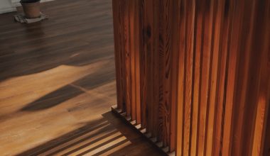 brown wooden staircase with brown wooden railings