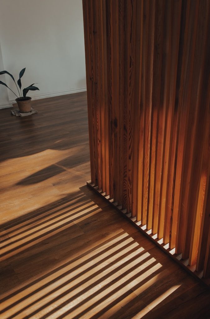 brown wooden staircase with brown wooden railings